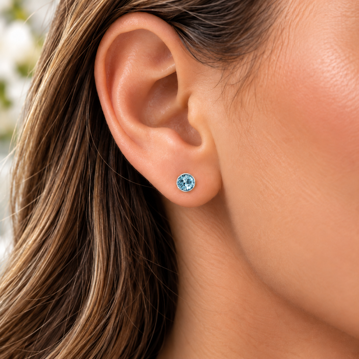 4mm March Aquamarine Birthstone Stud Earrings worn by model