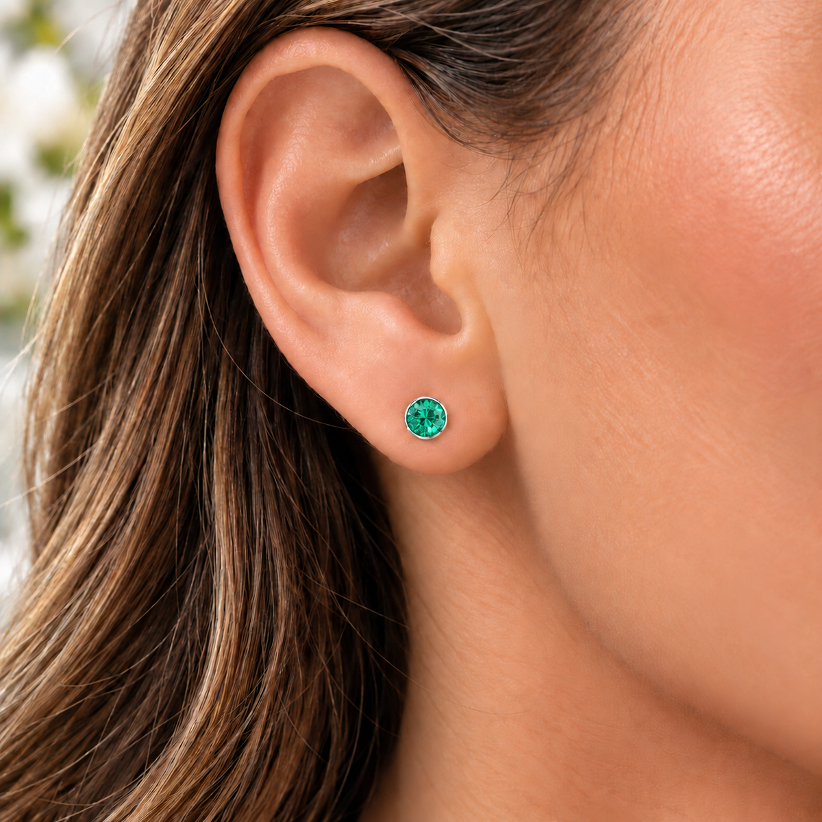 4mm May Emerald Birthstone Stud Earrings worn by model