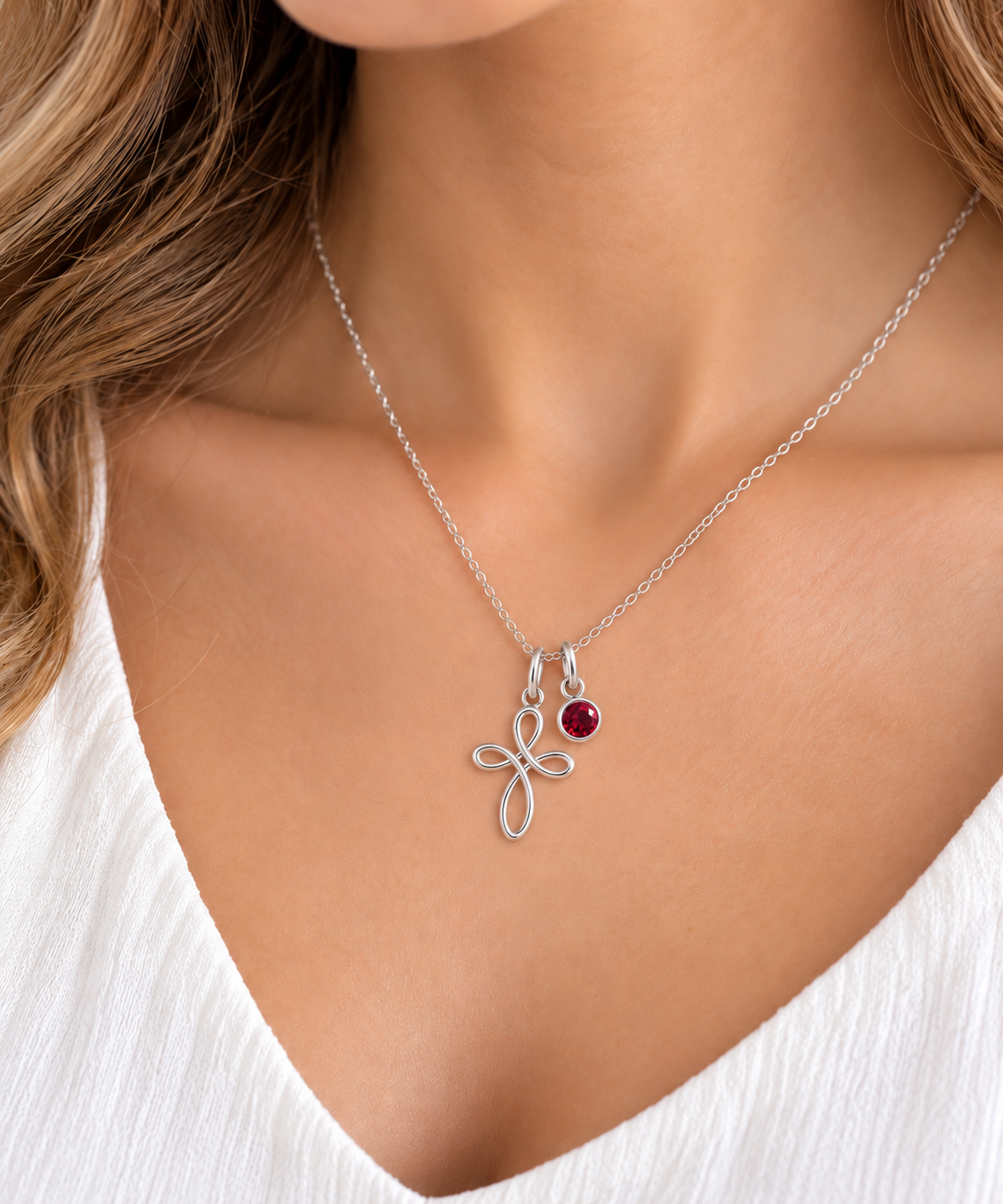 Eternity Cross Birthstone Necklace in sterling silver worn by model