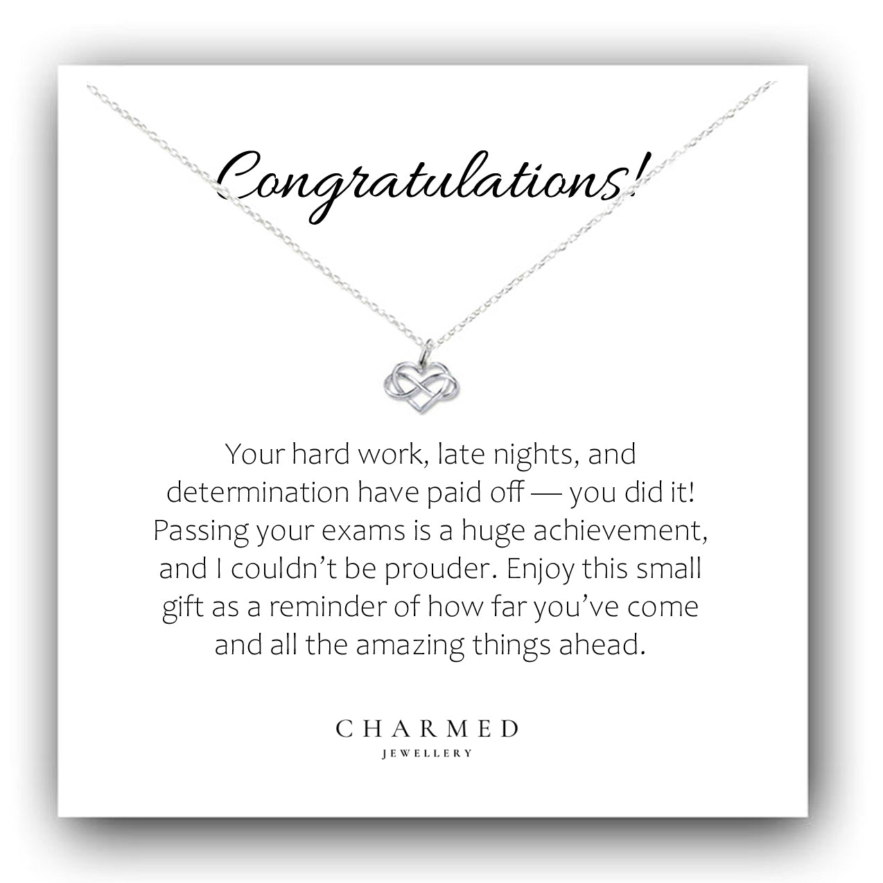 Necklace with a message card congratulating someone on passing exams, featuring the brand 'Charmed Jewellery'.
