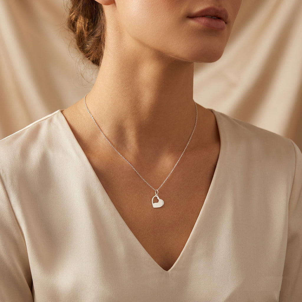 Sterling Silver Cut Out Heart Necklace worn by model
